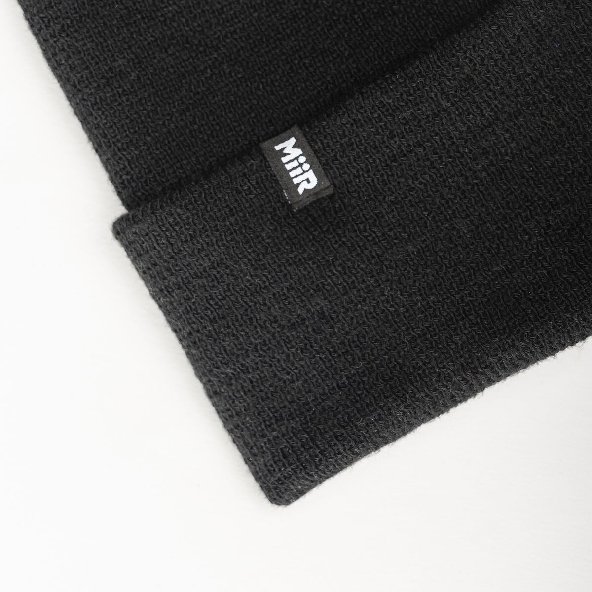 recycled-poly-fine-knit-beanie-r6 WebPDP-RecycledPolyFineKnitBeanie_Studio_TagDetail_Black__BNE005002OS.jpg