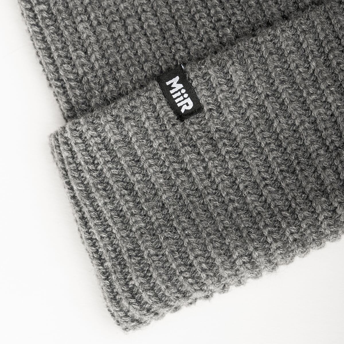 recycled-poly-rib-beanie-w0 WebPDP-RecycledPolyRibBeanie_Studio_TagDetail_GrayHeather__BNE002202OS.jpg