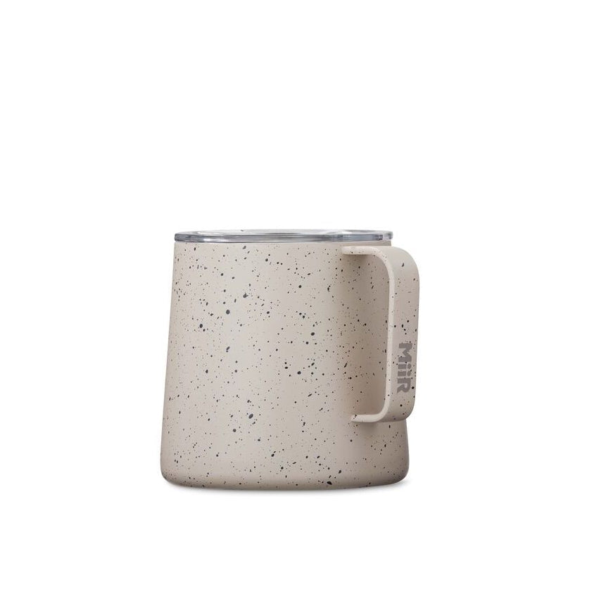 grounded-camp-cup-c2 Web_PDP-12oz_Grounded_Camp_Cup_Desert_Tan_Speckle_Studio_GCUSL1SV12224__Front_1.jpg